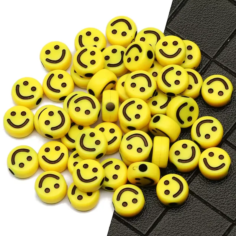 Perles jaunes en forme de smileys pour la fabrication de bracelets pour les enfants