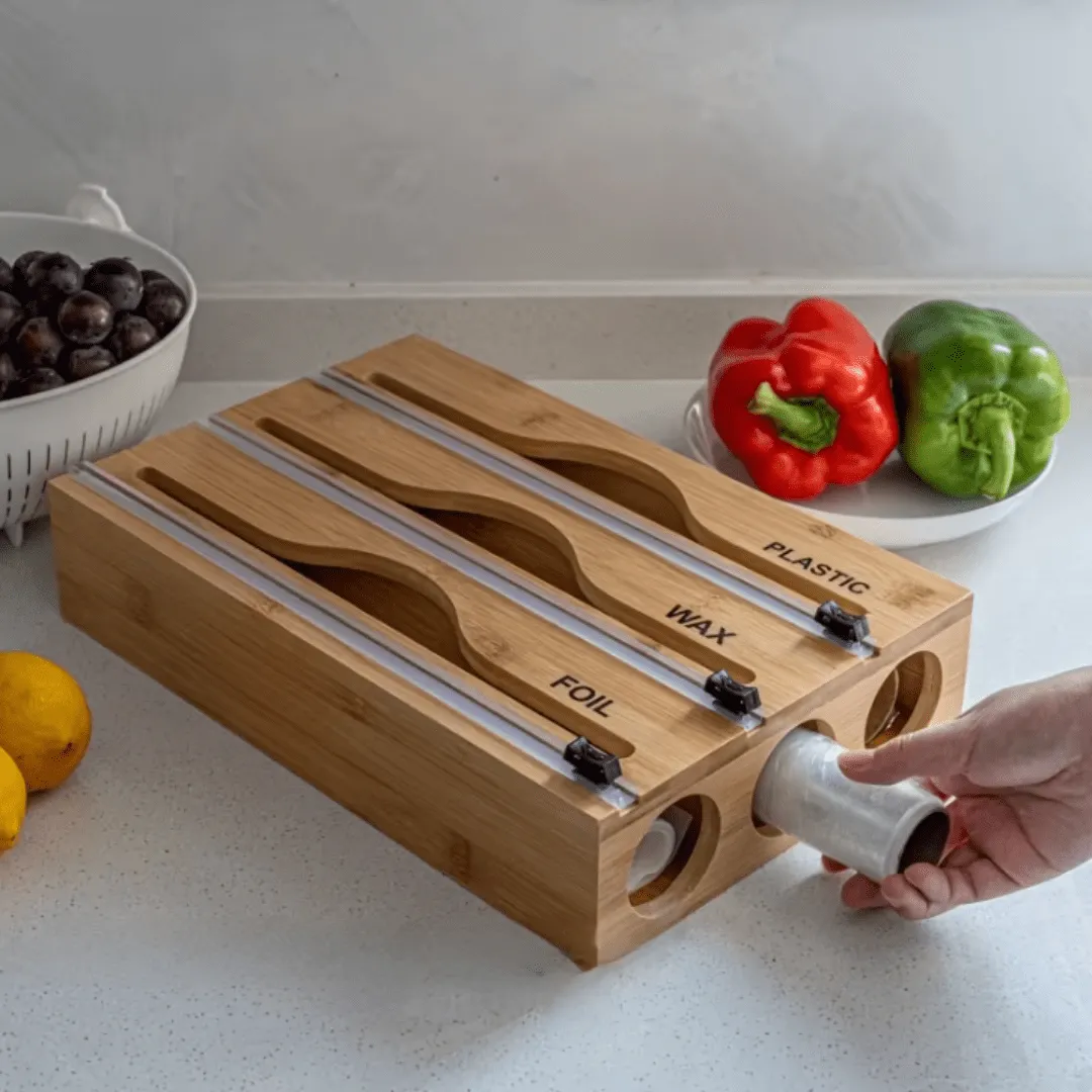 Distributeur 3 en 1 pour tiroir de cuisine – Avec coupeur pour papier aluminium, film alimentaire et papier ciré, en bambou.