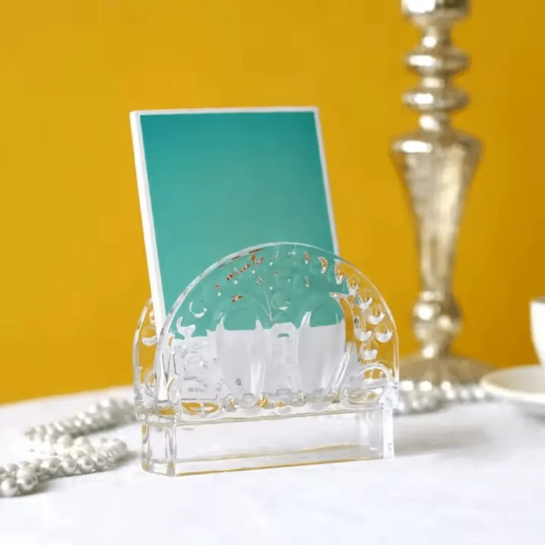 Porte-serviettes et cartes transparent au design raffiné.