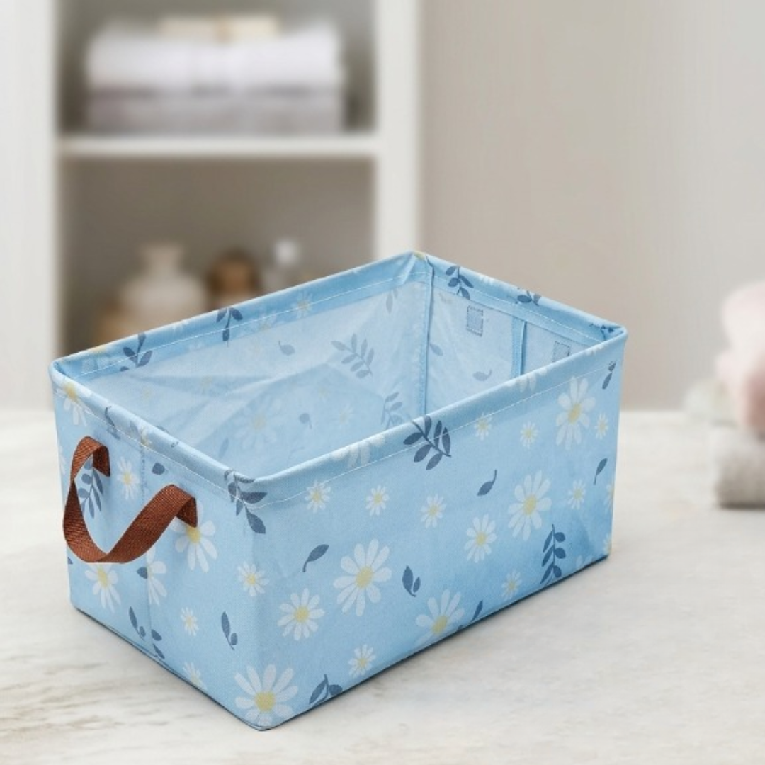 Boîte de rangement pliable pratique pour organiser et stocker divers objets tout en optimisant l’espace.
