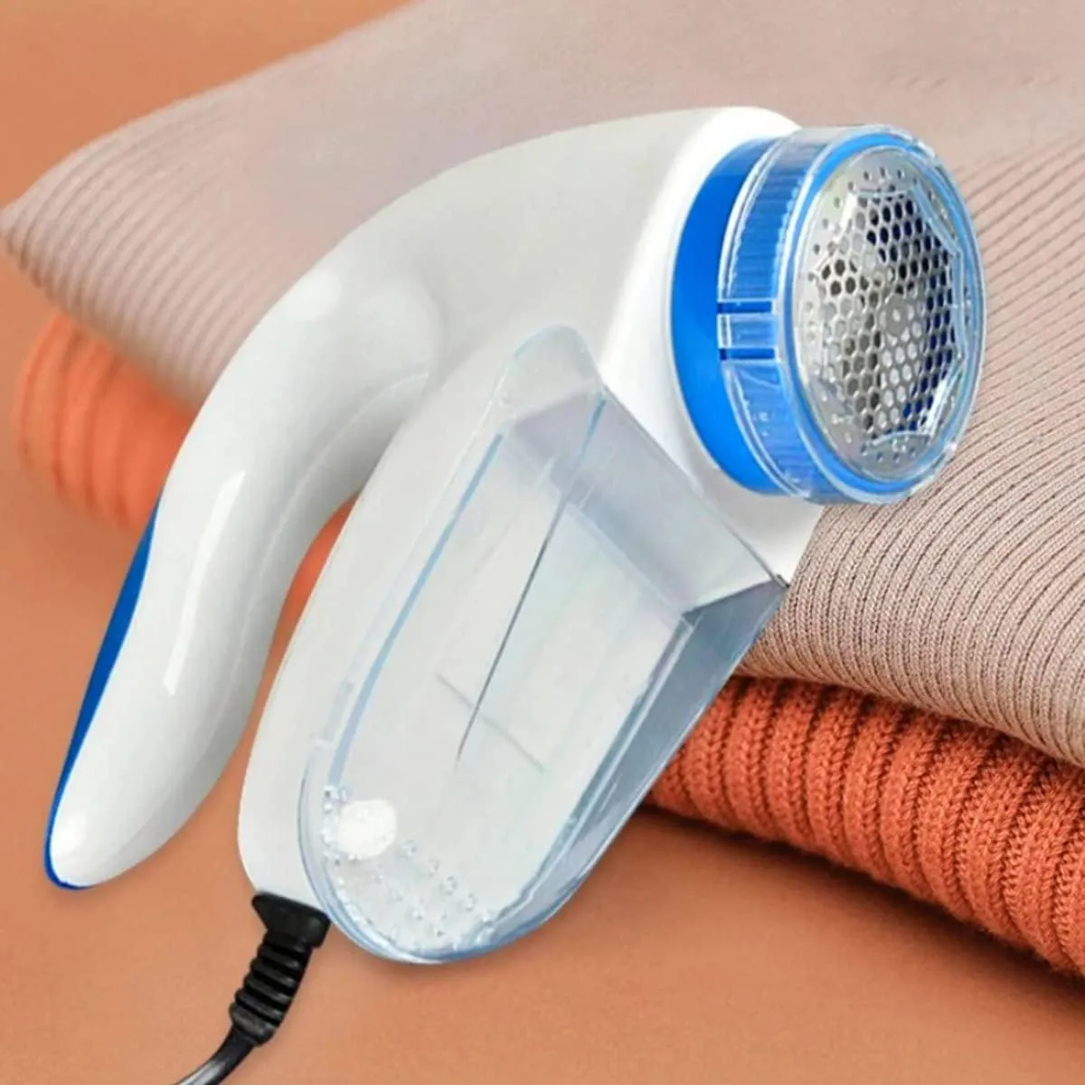 Dites adieu aux peluches avec notre Rasoir Électrique Anti Peluches pour Vêtements